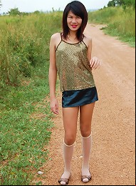 Unabashed ladyboy Gold posin...